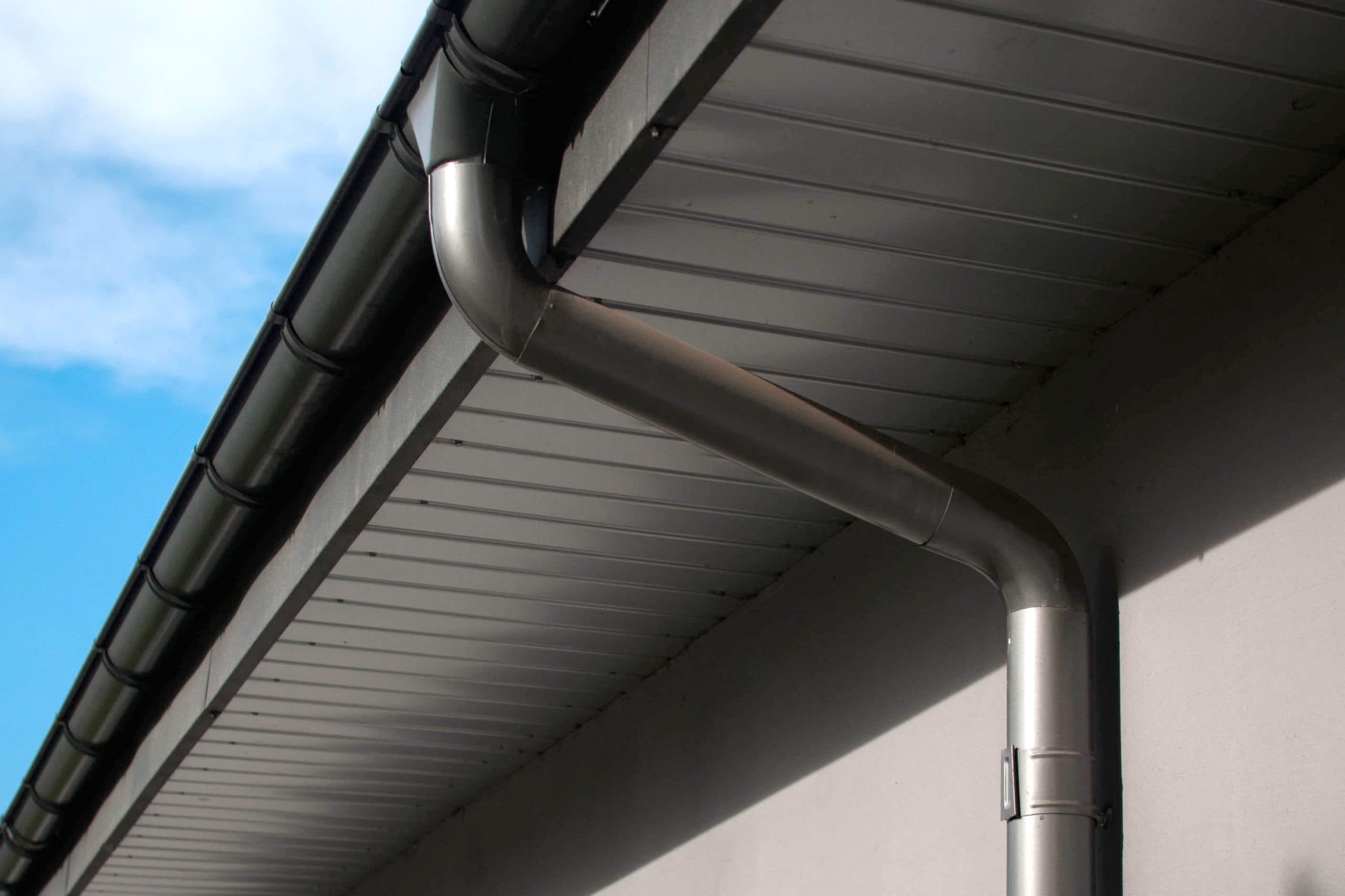 Corrosion-resistant galvanized gutters installed on a commercial building in Scranton